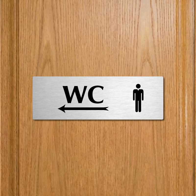 WC muži vlevo, 200x66mm, stříbrná popiska s ozdobou uprostřed